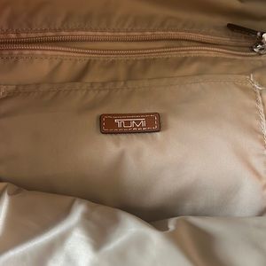 Authentic Tumi orange backpack